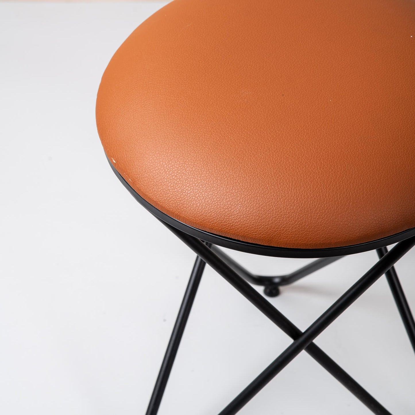 Metallic Stools: Tan Leatherette Cross Leg Ottoman