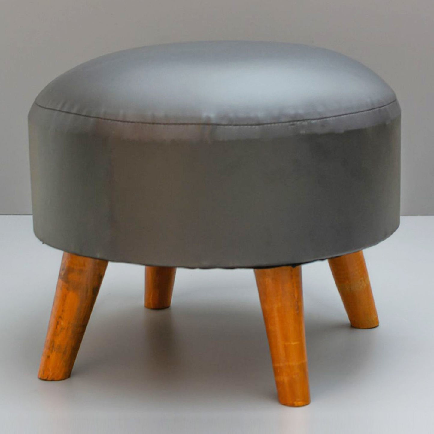 Wooden Ottomans: Black Round Leatherette Ottoman
